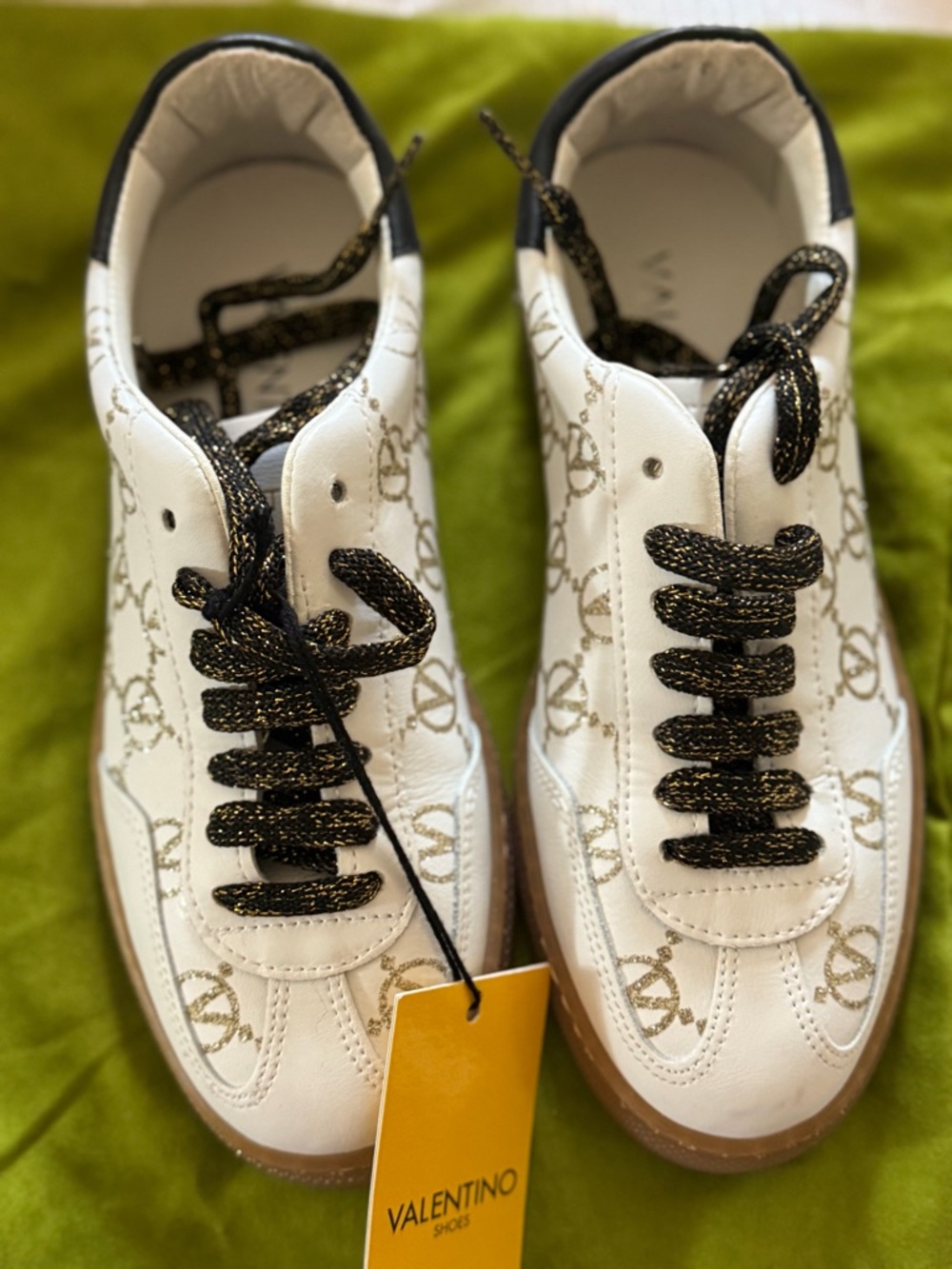 Valentino white with gold Vl logo sneakers